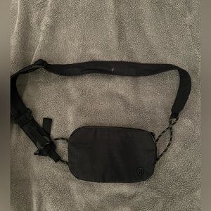 Black Lululemon cross body bag.